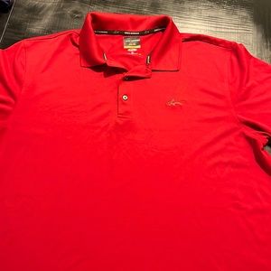 Greg Norman For Tasso Ella Polo. Size is XL. Worn once. Excellent condition.